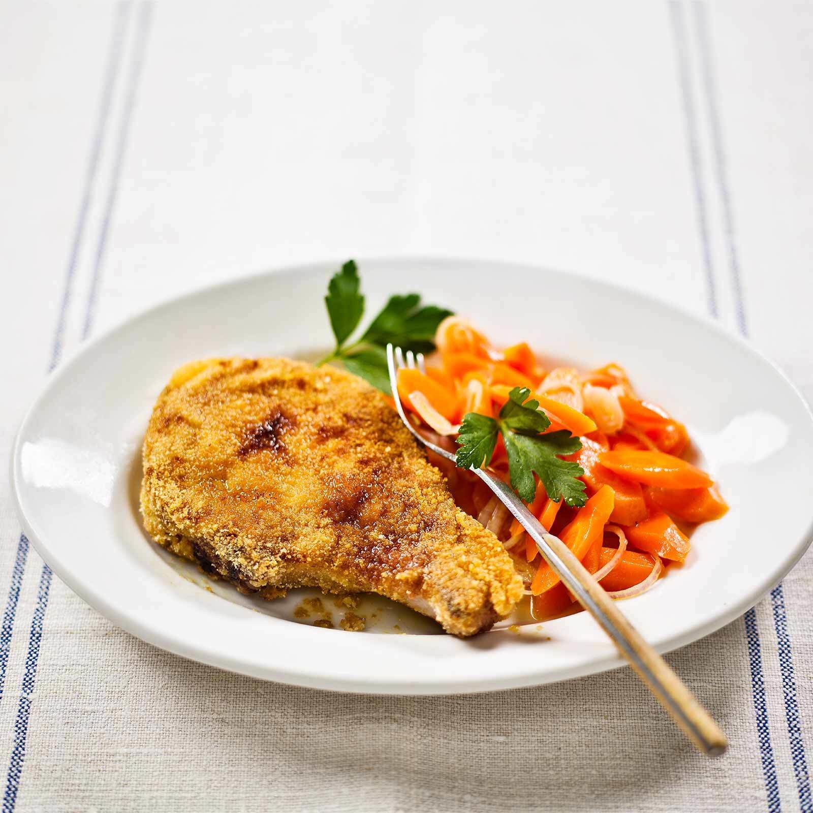 Kotelett mit warmem Rüeblisalat