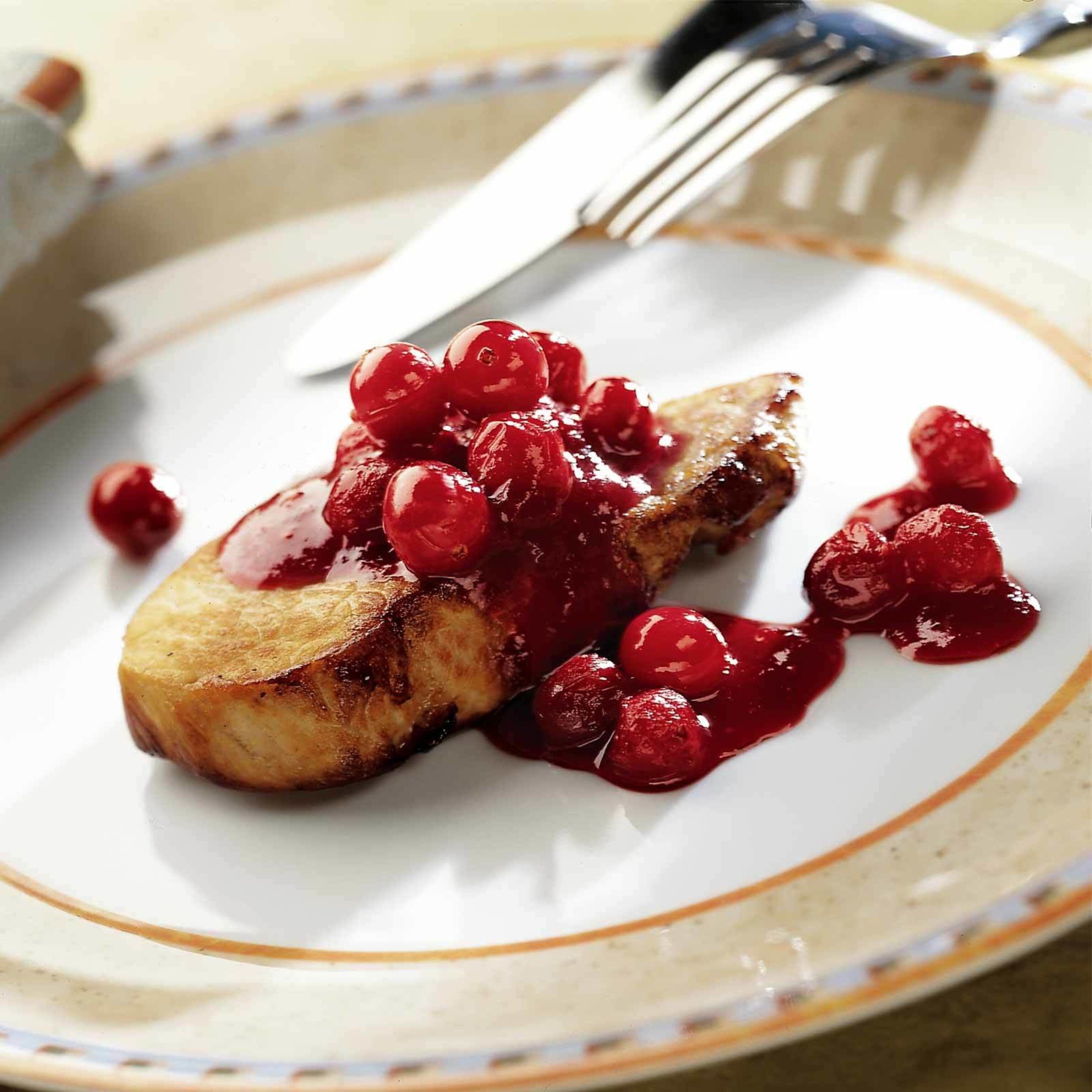 Schweinssteaks mit Cranberry-Sauce
