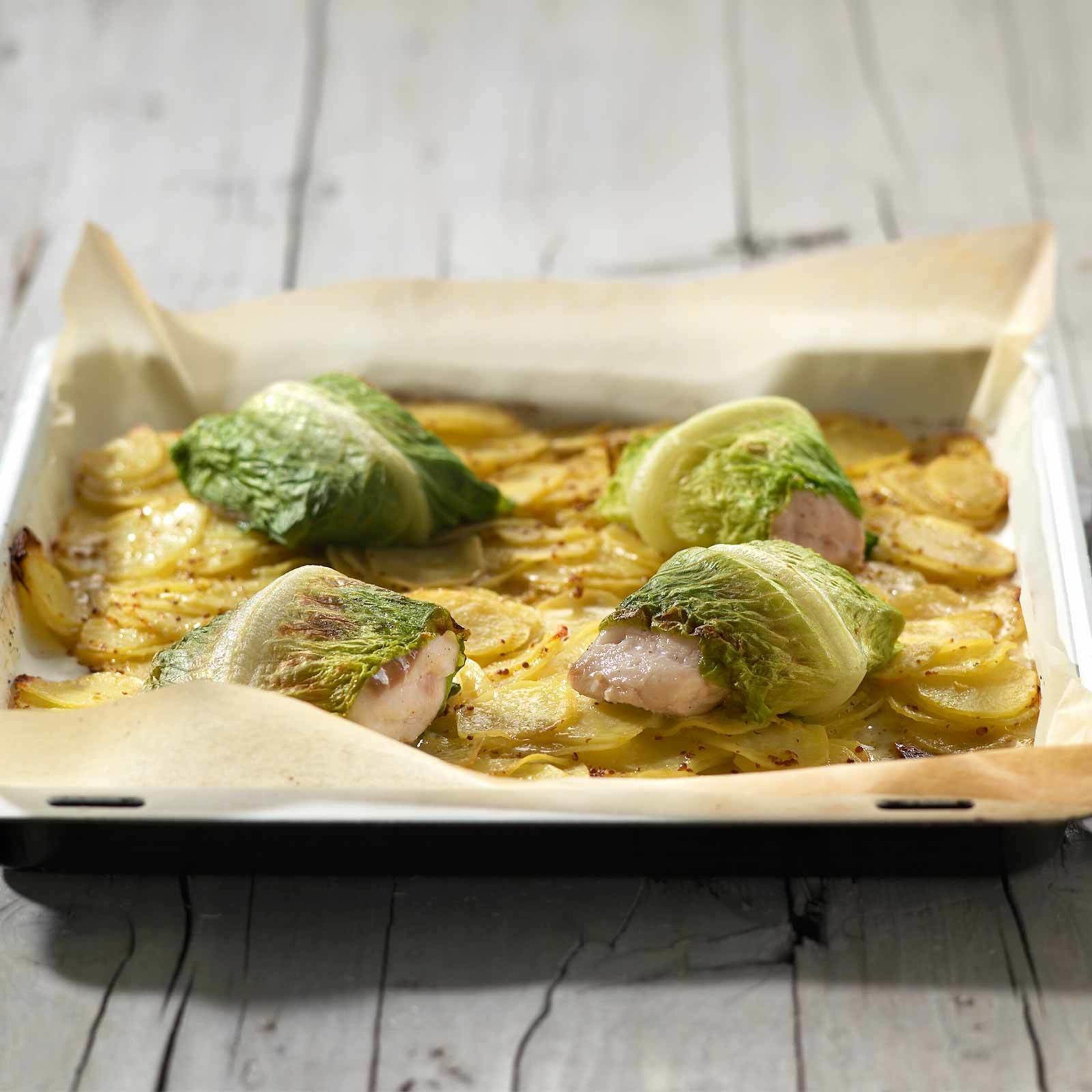 Fischpäckli auf Kartoffeln