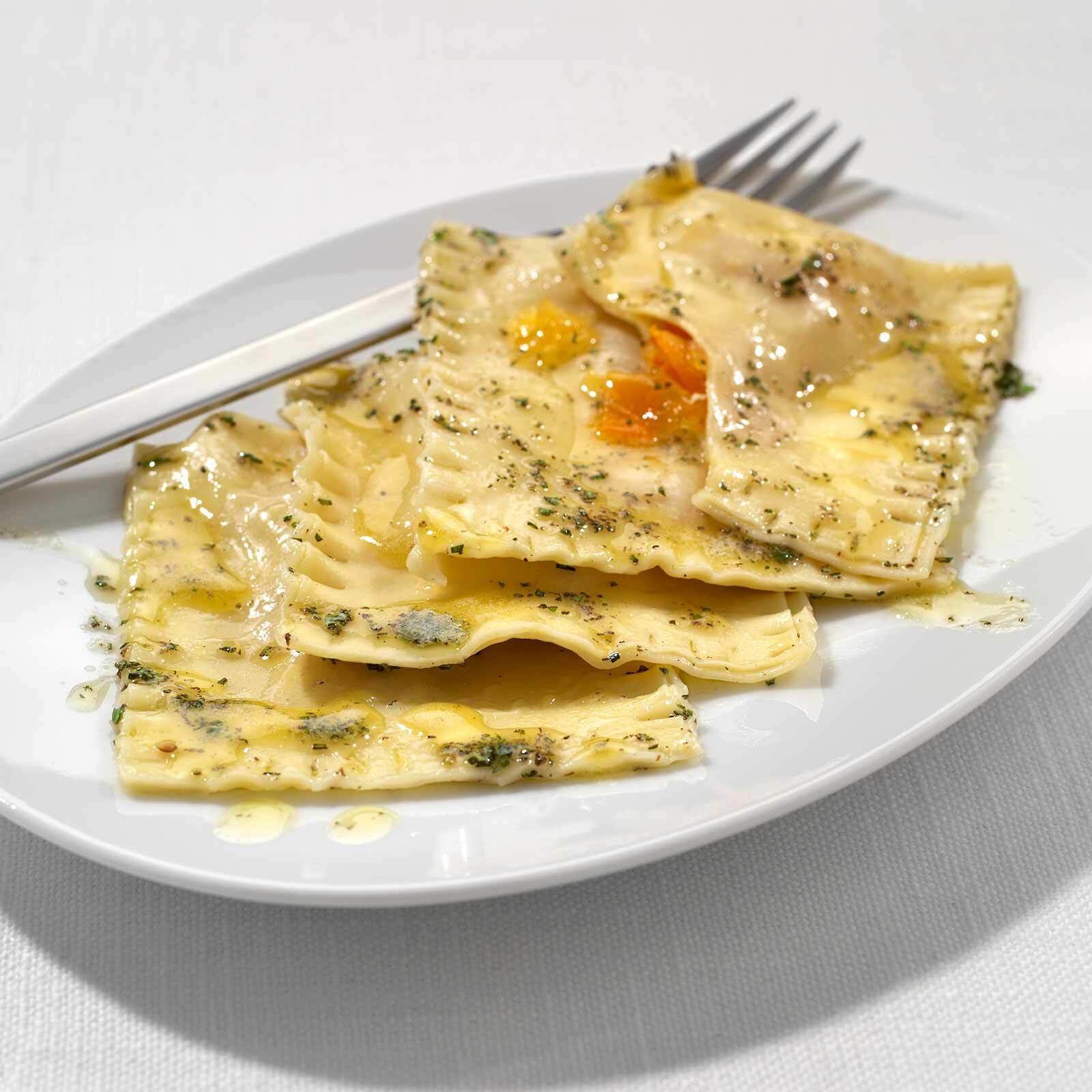 Kumquat-Ravioli an Rosmarinbutter